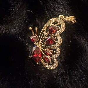 Elegant Gold Butterfly Pendant with Red Accents